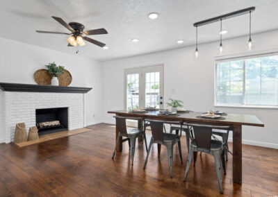 dining room with fireplaced staged for sale