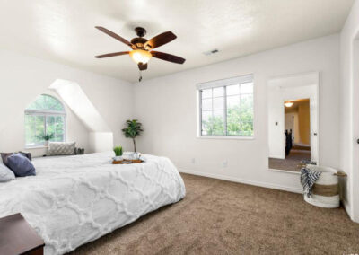orem home staging white bed in master bedroom