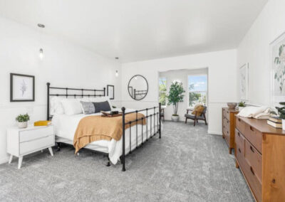 master bedroom with beautiful furnishings after home staging in orem ut