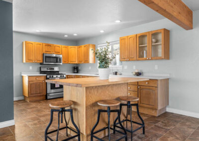 kitchen decorated with stools and decor