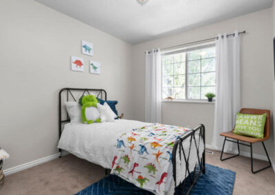 newly designed boys room with green blue and white elements