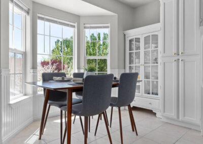 Breakfast nook with mid-century modern table and chairs in new dining area