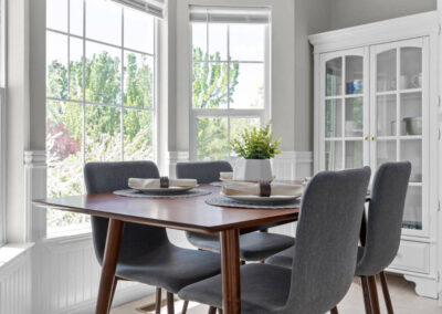 Breakfast nook with mid-century modern table and chairs in new dining area riverton ut